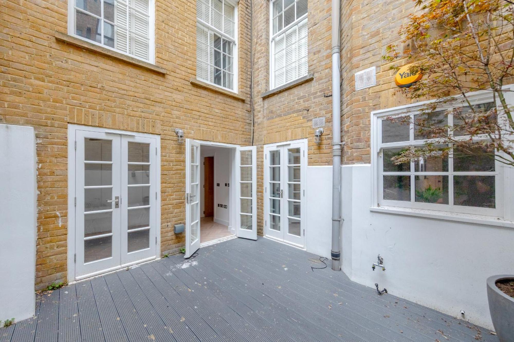 Sleek & Stylish 2bd Flat - Warren Street Apartment London